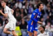 Jugadores del Real Madrid y Getafe durante el partido en el Santiago Bernabéu