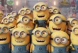 Grupo de Minions amarillos sonriendo y vistiendo sus clásicos overoles de mezclilla