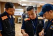 Oficiales de Acodeco realizando inspección en comercio local